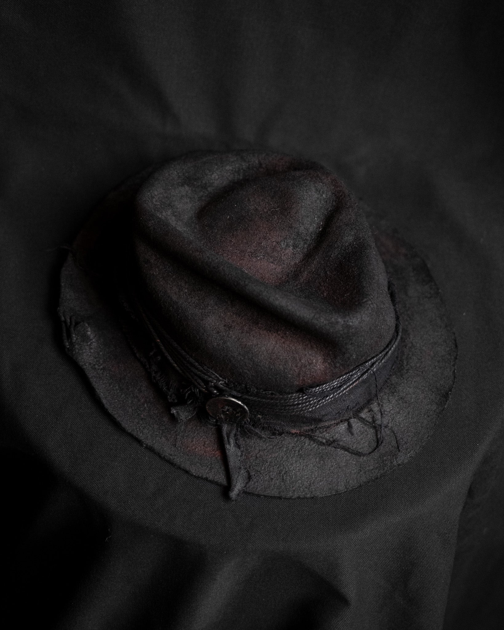 ALEKSANDER JURCZAK Distressed Dyed and Waxed Wool Hat with Detailed Work